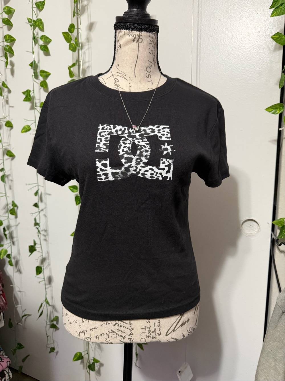 DC Black Baby Tee with White Leopard Logo